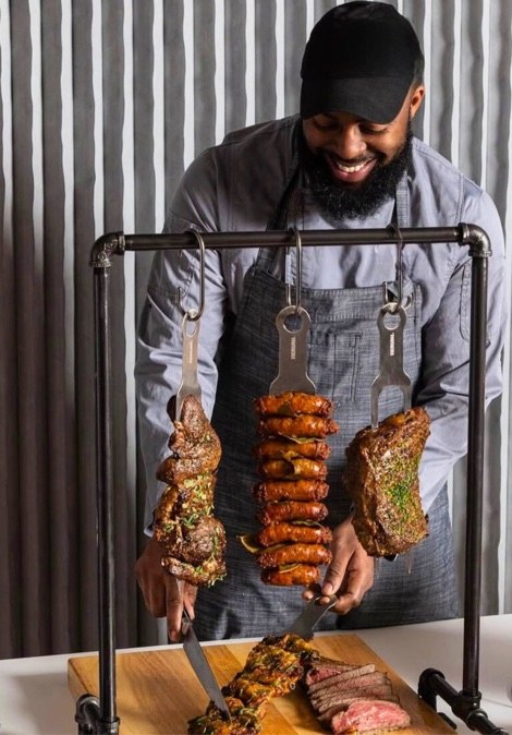 Jordan Cuffy of Cuffy's Kitchen grilling